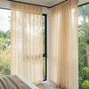 Custom Linden Linen Blend Sheer Curtain, beige fabric filtering light.